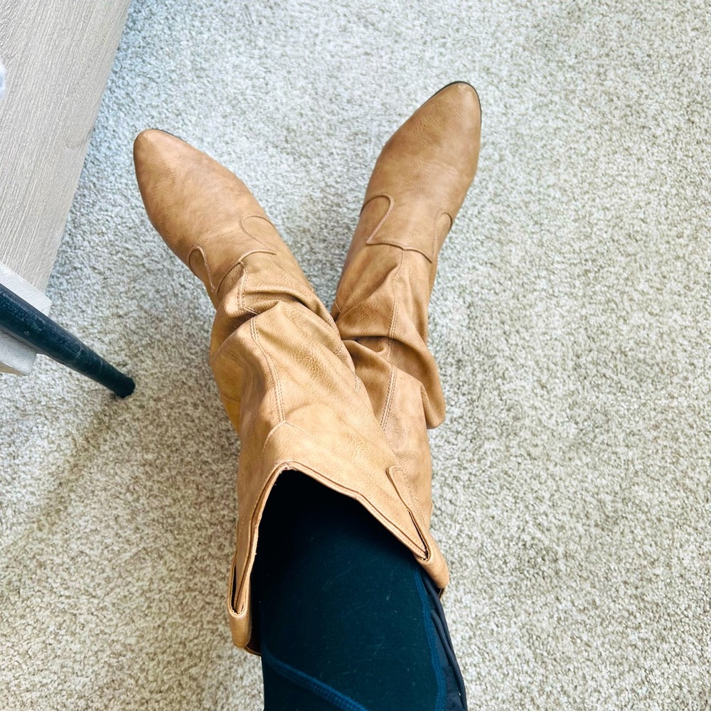 Cowgirl boots. Comfortable. Not a loud bottom.